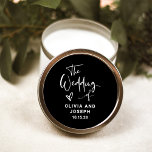 Modern Black and White Overlay | Wedding Classic Round Sticker<br><div class="desc">These modern,  elegant wedding stickers feature a dark,  black background with white trendy script typography and a hand-drawn heart.</div>