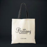 Modern Black and White Personalised Bridesmaids Tote Bag<br><div class="desc">Modern Black and White Personalised Bridesmaids Gifts
featuring personalised bridesmaid's name in modern calligraphy font style with title and wedding date in modern sans serif font style.

Also perfect for Maid of Honour,  Flower Girl,  Mother of the Bride and more.</div>