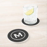 Modern Black Classic Monogram Stone Coaster<br><div class="desc">Minimal monogrammed design features a black background with your initial in classic block typography in white for a clean,  simple stylish look.</div>