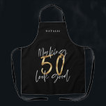 Modern black gold 50th birthday typography stylish apron<br><div class="desc">Modern black gold glitter 50th birthday typography stylish design.</div>