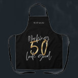 Modern black gold 50th birthday typography stylish apron<br><div class="desc">Modern black gold glitter 50th birthday typography stylish design.</div>