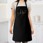 Modern Black Gold Feminine Script Monogrammed Apron<br><div class="desc">Modern Black Gold Feminine Script Monogrammed Apron. Easily personalise this modern elegant apron with your custom monogram and name.</div>