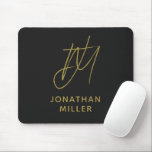 Modern Black Gold Monogram Mouse Mat<br><div class="desc">Keep your workspace stylish and functional with this Modern Black Gold Monogram Mouse Pad. The sleek design features a customisable monogram on a black background, and the non-slip rubber base ensures a secure grip on any surface. Perfect for both personal and professional use, this mouse pad is a great way...</div>