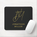 Modern Black Gold Monogram Mouse Mat<br><div class="desc">Keep your workspace stylish and functional with this Modern Black Gold Monogram Mouse Pad. The sleek design features a customisable monogram on a black background, and the non-slip rubber base ensures a secure grip on any surface. Perfect for both personal and professional use, this mouse pad is a great way...</div>