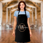 Modern Black Gold Monogram Script Name Apron<br><div class="desc">Modern stylish black and gold script name monogram apron. You can personalise the name and monogram initial to create your own unique design. Designed by Thisisnotme©</div>