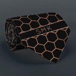 Modern Black Rose Gold Foil Geometric Monogram Tie<br><div class="desc">Modern Black and Rose Gold Foil Geometric Monogram Necktie in a stylish pattern of copper rose gold hexagons on an elegant black background. Easy to customise with text, fonts, and colours. Created by Zazzle pro designer BK Thompson © exclusively for Cedar and String; please contact us at cedarandstring@gmail.com if you...</div>