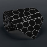 Modern Black Silv Foil Geometric Monogram Neck Tie<br><div class="desc">Modern Black with Faux Silver Foil Geometric Monogram Necktie in a stylish pattern of silver grey hexagons on an elegant black background. Easy to customise with text, fonts, and colours. Created by Zazzle pro designer BK Thompson © exclusively for Cedar and String; please contact us if you need assistance, have...</div>