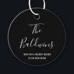 Modern Black Typography Name Holiday Favour Tags<br><div class="desc">Add holiday cheer with this modern gift / favour tag featuring a simple design with your name in a large format handwritten script font along with your personalised message in white over a black background. The elegant font for your name gives this minimalist design a chic touch. These tags are...</div>