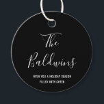Modern Black Typography Name Holiday Favour Tags<br><div class="desc">Add holiday cheer with this modern gift / favour tag featuring a simple design with your name in a large format handwritten script font along with your personalised message in white over a black background. The elegant font for your name gives this minimalist design a chic touch. These tags are...</div>
