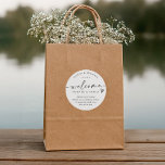 Modern Black & White Wedding Welcome Hotel Bag Classic Round Sticker<br><div class="desc">Hotel Bag Stickers: Welcome guests in style with these black and white modern handwriting hotel bag stickers, perfect for greeting friends and family as they arrive for your wedding weekend. Each round 3-inch sticker features the warm phrase “welcome friends & family” with a small heart accent above your custom message....</div>
