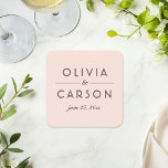 Modern Blush and Black Wedding Monogram Square Paper Coaster<br><div class="desc">Modern and chic blush pink wedding coasters feature an elegant and minimal black typographic monogram design that can be personalised with the bride and groom names and wedding date.</div>