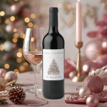 Modern Blush Christmas Tree Wine Label<br><div class="desc">Elevate your holiday gifting with this Modern Blush Christmas Tree Wine Label, featuring a soft pastel pink Christmas tree, elegant sparkle accents, and personalized name text. Perfect for hostess gifts, Christmas parties, dinner events, and festive celebrations. Customize with your own name or year to create a beautiful keepsake that matches...</div>