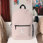 Modern Blush Pink Stylish Monogram Typography Printed Backpack<br><div class="desc">A softly feminine backpack design with a stylish layout of your name and monogram with classic serifs and a more ornate script typography in a balanced symmetry. The three elements blend together with a sophisticated harmony and create your own personal branding logo. Shown here with a blush pink background with...</div>