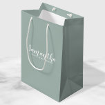 Modern Bridesmaid Proposal Medium Gift Bag<br><div class="desc">Modern Bridesmaid Proposal Gift Bag
featuring personalised bridesmaid's name in white modern script font style with text in modern sans serif font style on sage green background.

Also perfect for maid of honour,  flower girl and more.</div>