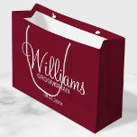 Modern Burgundy Red Personalised Groomsman Large Gift Bag<br><div class="desc">Personalised Groomsman Gifts
featuring personalised groomsman's name in white modern script font style with title and wedding date in modern sans serif font style on burgundy red background.

Also perfect for best man,  father of the bride,  bridesmaid,  maid of honour,  mother of the bride and more.</div>