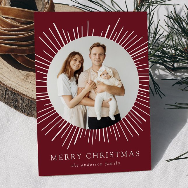 Modern Burgundy Sunburst Merry Christmas 2 Photo Holiday Card (Creator Uploaded)