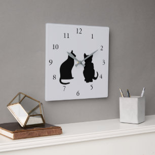Modern cat silhouettes, pets on  gray background square wall clock