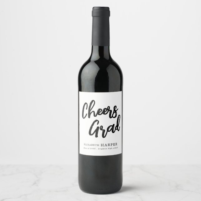 Modern Cheers Grad Brush Script Graduation  Wine Label (Front)