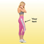 Modern chic golf text pattern pink capri leggings<br><div class="desc">Fun leggings in pink for a keen golfer. The bold geometric pattern at the base of the legs is created from golf clubs and golf balls on a pink background. Bright and cheerful. The text down the side of each leg is in black on a silver grey stripe, and can...</div>
