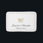 Modern Chic Monogram Names Newlywed Wedding White Bath Mat<br><div class="desc">Modern Chic Monogram Names Newlywed Wedding White Bath Mat. Stylish personalised white and gold monogrammed bath mat. Classic script for the monogrammed last name initial of the couple, the names of the bride and groom and the marriage date on a chic white background. The perfect gift for newly weds, engaged...</div>