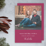 Modern Christmas | Couple Photo Burgundy Maroon Holiday Card<br><div class="desc">Stylish modern holiday photo flat photo card with a classic typography quote "warm holiday wishes - from our family to yours" paired with a handwritten script font for your family name in white on a burgundy ruby maroon crimson scarlet wine red background. The greeting and name can be easily customised...</div>
