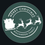 Modern Christmas Family Name Santa Green Custom Classic Round Sticker<br><div class="desc">Elevate your holiday gift-giving with our Modern Christmas Holidays Classic Round Sticker. This versatile sticker adds a touch of contemporary festive flair to your seasonal preparations. Featuring sleek,  minimalist designs with a festive twist,  this sticker blend traditional holiday motifs with modern aesthetics.</div>