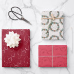 Modern Christmas Joyful Red Wreath Wrapping Paper Sheet<br><div class="desc">a beautiful way to wrap your christmas gifts. Featuring the first design with a christmas wreath witj pine cones and berries with the word joy in a modern calligraphy. The second design the word joyful with a modern calligraphy over a dark red background making it pop. and the third design...</div>