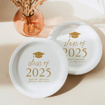 Modern Class of 2025 Gold Script Graduation Paper Plate<br><div class="desc">Add a personalised touch to your graduation party with these modern graduation paper plates! The paper plates feature a graduation cap at the top of the design with "Class of 2025" displayed in bold gold lettering. Personalise the gold graduation plates with the graduate's name, school, and graduation year. This design...</div>