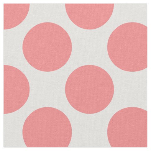 coral and white polka dot fabric