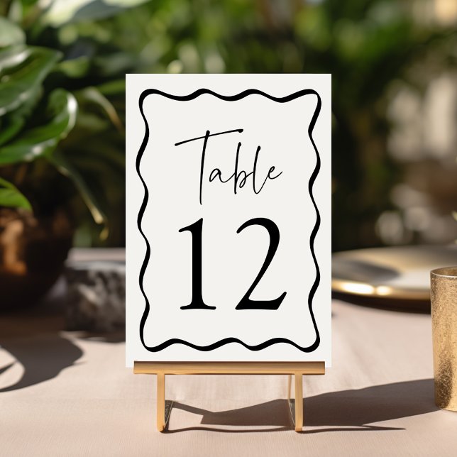 Modern Cream and Black Wavy Frame Wedding Table Number (Creator Uploaded)