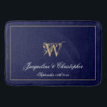 Modern Cute Blue Monogram Names Newlywed Wedding Bath Mat<br><div class="desc">Modern Cute Blue Monogram Names Newlywed Wedding Bath Mat. Chic stylish personalised navy blue and gold monogrammed bath mat. Classic script for the monogrammed last name initial, the names of the bride and groom and the date on a chic navy blue background. A perfect gift for newly weds, engaged couples...</div>