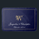 Modern Cute Blue Monogram Names Newlywed Wedding Bath Mat<br><div class="desc">Modern Cute Blue Monogram Names Newlywed Wedding Bath Mat. Chic stylish personalised navy blue and gold monogrammed bath mat. Classic script for the monogrammed last name initial, the names of the bride and groom and the date on a chic navy blue background. A perfect gift for newly weds, engaged couples...</div>
