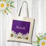 Modern Daisies Purple Trendy Floral  Tote Bag<br><div class="desc">Modern Trendy floral tote bag,  with a white daisies design with a purple background. With white customisable script typography lettering you can add your own name. Great for adding a botanical style to your accessories.</div>