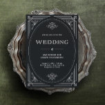 Modern Deco | Elegant Onyx Black and White Wedding Invitation<br><div class="desc">These glamourous wedding invitations feature a modern spin on classic art deco. An ornate,  white geometric frame and ornamentation decorate an elegant dark onyx black background for a dramatic,  vintage wedding look.</div>