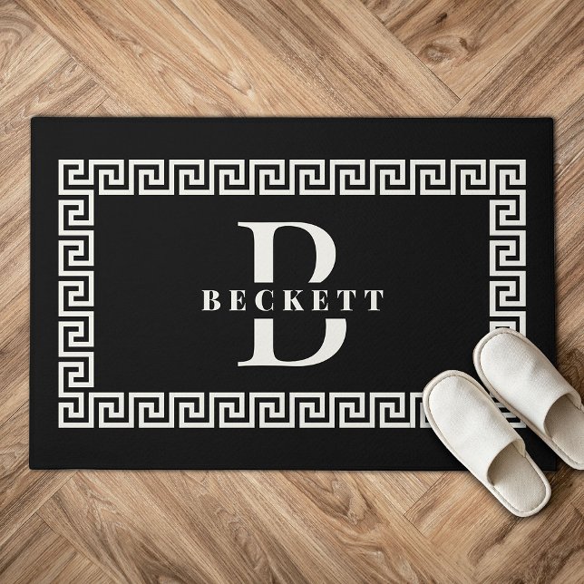 Modern Elegant Black Greek Key Frame Monogram Doormat (Black doormat with a Greek key border, featuring the large letter "B" and "BECKETT" in white. )