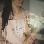 Modern Elegant Blush Pink Monogram Apron<br><div class="desc">A handwritten monogram design in an elegant style in black informal casual script typography over a blush bold pink initial oversized letter. The text can easily be customised for a design as unique as you are!</div>