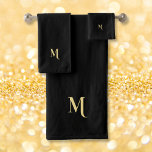 Modern Elegant Faux Gold Script Monogrammed Black Bath Towel Set<br><div class="desc">Create your own custom, personalised, modern, minimalist, cool, stylish, elegant faux gold calligraphy typography script font monogrammed initial, trendy, machine washable, bath towel set that includes 30" x 60" bath towel, 16" x 28" hand towel and 13" x 13" washcloth. To customise, simply type in your monogram / initials. Makes...</div>