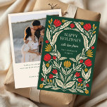 Modern Elegant Folk Floral Christmas Photo Holiday Card<br><div class="desc">Celebrate the season with this bold and beautifully illustrated holiday card featuring hand-drawn folk-style florals in festive red, gold, and cream on a rich green background. The front design showcases a cheerful “Happy Holidays” greeting framed by elegant botanical elements, with customisable text for your family name. Flip the card over...</div>