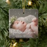 Modern Elegant Photo Babys First Christmas Ceramic Ornament<br><div class="desc">Modern birth announcement Christmas ornament featuring two of your favorite photos and elegant typography. The front side has baby's name in a large format white handwriting font over your favorite full bleed photo. The backside has the second picture along with baby's birth stats in black over a white background. This...</div>