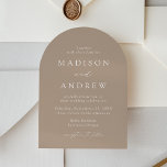 Modern Elegant Script Taupe Arch Wedding Invitation<br><div class="desc">Introduce your wedding with understated elegance using our minimalist and modern wedding invitations, featuring your details in crisp white lettering paired with a refined calligraphy script. Set against a neutral taupe background, these invitations offer a timeless and sophisticated aesthetic. The contemporary arch shape adds a unique and stylish flair, making...</div>