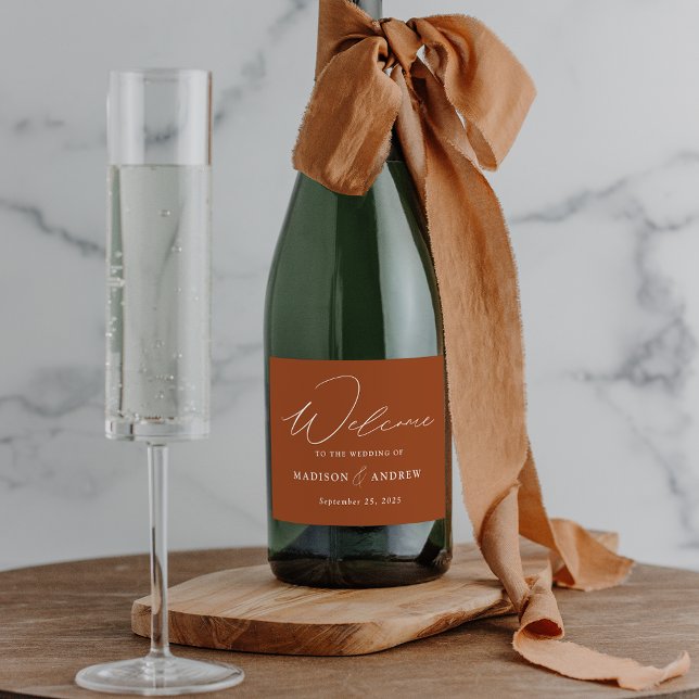 Modern Elegant Script Terracotta Wedding Sparkling Wine Label (Creator Uploaded)