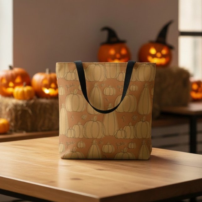 Modern Fall Pumpkin Pattern in Orange Tote Bag (A minimalist line art orange pumpkin Halloween tote bag, in front of spooky jack-o-lantern decor.)