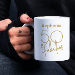 Modern Fifty & Fabulous Gold Script 5oth Birthday Coffee Mug<br><div class="desc">Celebrate a 50th birthday with this stylish,  black & gold coffee mug personalised with the name of the birthday honoree. "50 & Fabulous" is in a gold,  modern script. Click "personalise" to edit the design's font colour or transfer it to a different product. You can edit the age too.</div>