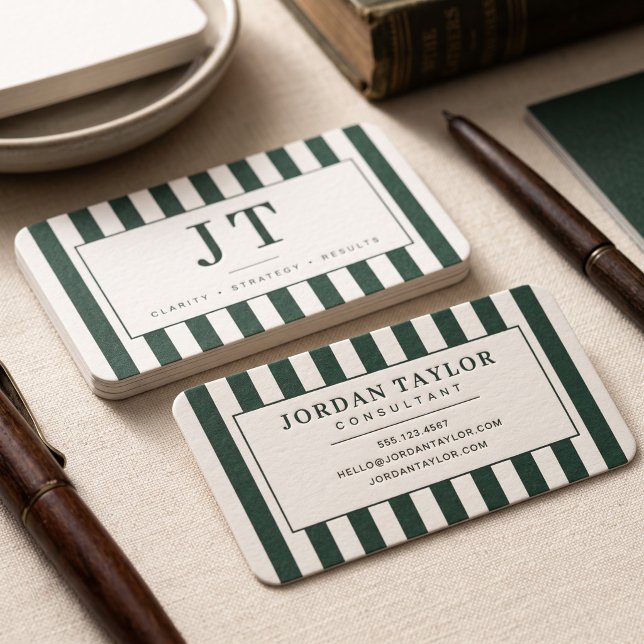 Modern Forest Green Striped Monogram Business Card (Simulated business cards on table)