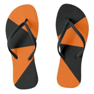 Modern Geometric Black and Orange Pattern Flip Flops