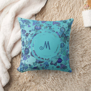 Modern geometric shapes with monogram in blue cushion