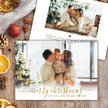 Modern Gold Script 2 Photo White Merry Christmas Holiday Card<br><div class="desc">Elegant Modern Minimalist Gold Script 2 Photo Merry Christmas Script Holiday Card. This festive, minimalist simple, whimsical two (2) photo holiday greeting card template features „Merry Christmas” greeting text in a hand lettered whimsical swirly swash-tail font calligraphy script in gold colour on photo overlay. On the reverse side with your...</div>
