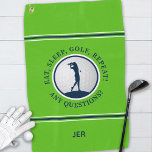 Modern Golfer Monogram Pro Sports Golf Green Blue Golf Towel<br><div class="desc">Modern design features a bright green background showcasing a realistic golf ball with a female golfer silhouette in dark blue accented with white & dark blue stripes. Fun golf quote text reads, "Eat, Sleep, Golf, Repeat! Any Questions" in dark blue typography. Customise with name, initials or short line of custom...</div>