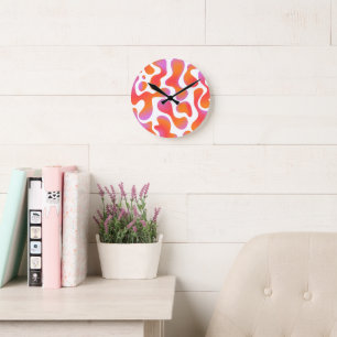 Modern Gradient Blobs Pattern in Pink and Orange Round Clock