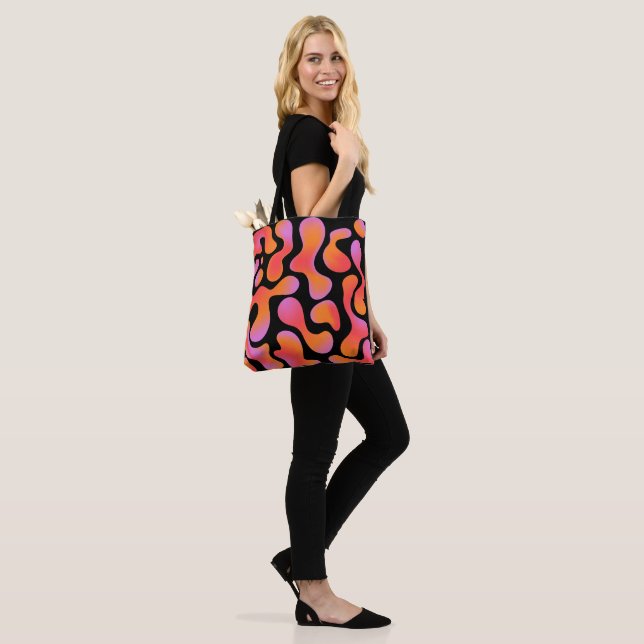 Modern Gradient Blobs Pattern in Pink and Orange Tote Bag (On Model)